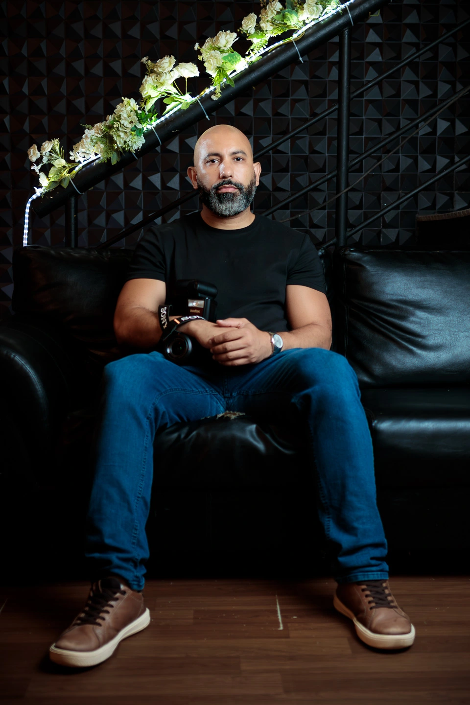 Rogério de Souza durante uma cobertura fotográfica